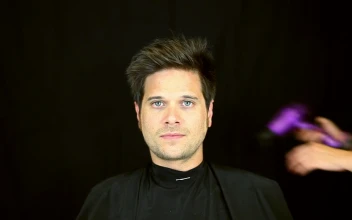 Free Video Stock Stylist Combing The Hair Of A Man