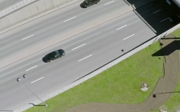 Free Video Stock Summer Traffic Over A Metal Bridge