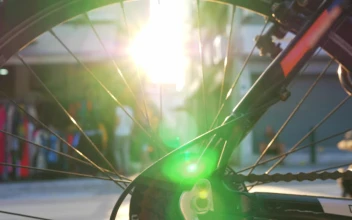 Free Video Stock Sun Flare Through A Bike Wheel