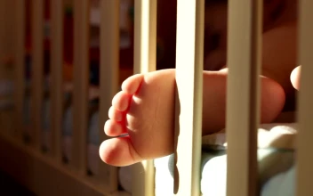 Free Video Stock Sun Light Over A Sleeping Baby