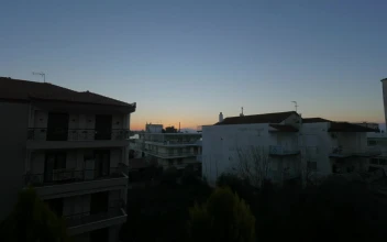 Free Video Stock Sun Rising Above A Small Town