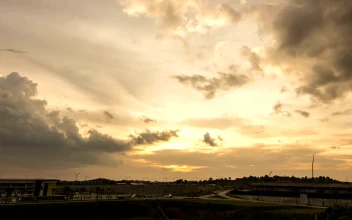 Free Video Stock Sun Setting Across A Highway