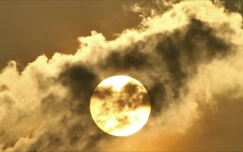 Free Video Stock Sun Shining Brightly Behind The Clouds