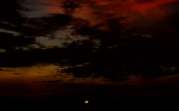 Free Video Stock Sunrise Across A Deep Black Sky