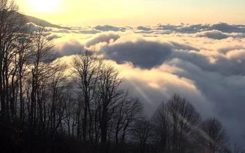Free Video Stock Sunrise At A Cloudy Top Of The Mountain