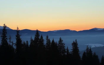 Free Video Stock sunrise in snowy mountains static shot