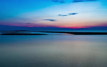 Free Video Stock sunrise seen from a river landscape