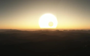 Free Video Stock sunset between moons and silhouettes on an alien planet