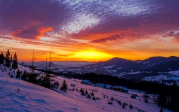 Free Video Stock sunset over a snowy winter mountain