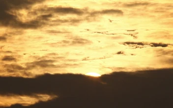 Free Video Stock sunshine breaking over the clouds