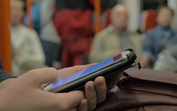 Free Video Stock surfing the internet while on a bus