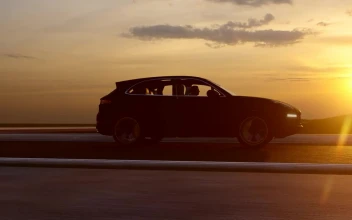 Free Video Stock suv in a road at sunset tracking shot