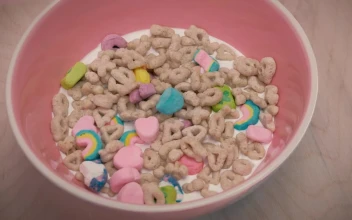 Free Video Stock sweetened cereal with marshmallows and milk in a bowl