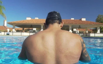 Free Video Stock swimmer in the pool seen from behind