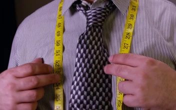Free Video Stock tailor tying up a measuring tape