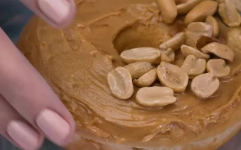 Free Video Stock taking a peanut butter donut from a plate