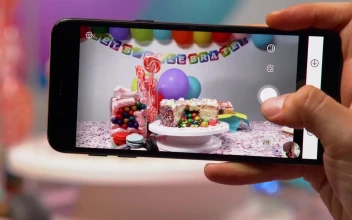 Free Video Stock taking a picture of a birthday table with a smartphone