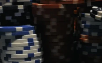 Free Video Stock taking down a tower of poker chips