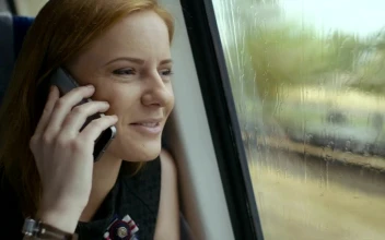 Free Video Stock talking on the phone while traveling