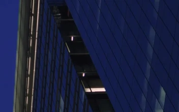 Free Video Stock tall building full of windows at dusk