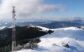 Free Video Stock tall telecommunication tower in the snow