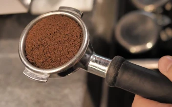 Free Video Stock tamping coffee for a coffee maker