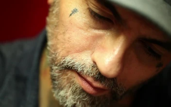 Free Video Stock tattoo artist doing a tattoo to a client