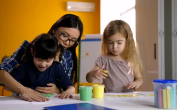 Free Video Stock teacher and girls painting with their hands