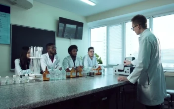 Free Video Stock teacher explaining chemistry to students