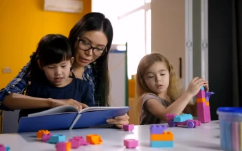 Free Video Stock teacher reading with her students