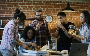 Free Video Stock team eating pizza in the office