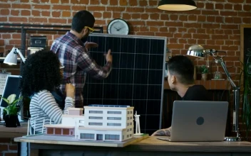 Free Video Stock team of architects reviewing a building model