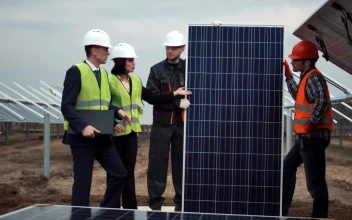 Free Video Stock team of engineers working with solar panels