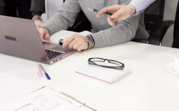 Free Video Stock team working in a project on a laptop