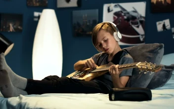 Free Video Stock teen boy practicing guitar on his bedroom