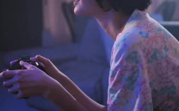 Free Video Stock teen playing video games in the living room