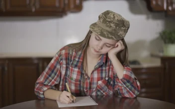 Free Video Stock teenage girl writes letter to army dad