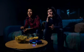 Free Video Stock teens watching a funny film together