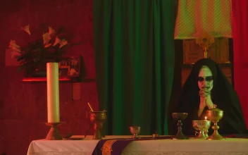 Free Video Stock terrifying ghost nun praying in a temple