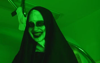 Free Video Stock terrifying woman disguised as a nun under a green light