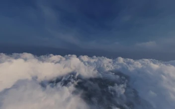 Free Video Stock texture of a short flight over the clouds
