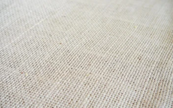 Free Video Stock texture of brazil nuts falling on a tablecloth