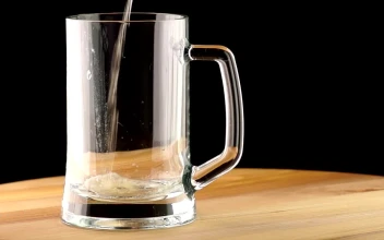 Free Video Stock the beer poured into a mug