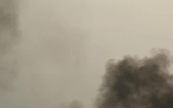Free Video Stock thick smoke rising from the ground