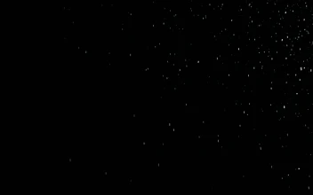 Free Video Stock thick snow falling in a black background