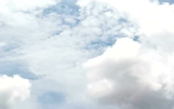 Free Video Stock thick white clouds above a city