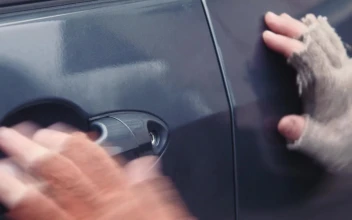Free Video Stock thief unlocking a car door