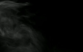 Free Video Stock thin smoke drifting in the dark