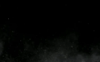 Free Video Stock thin snow falling in the dark