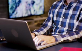 Free Video Stock thinking man places hand on chin in home office